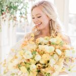 Bridal portrait with yellow roses