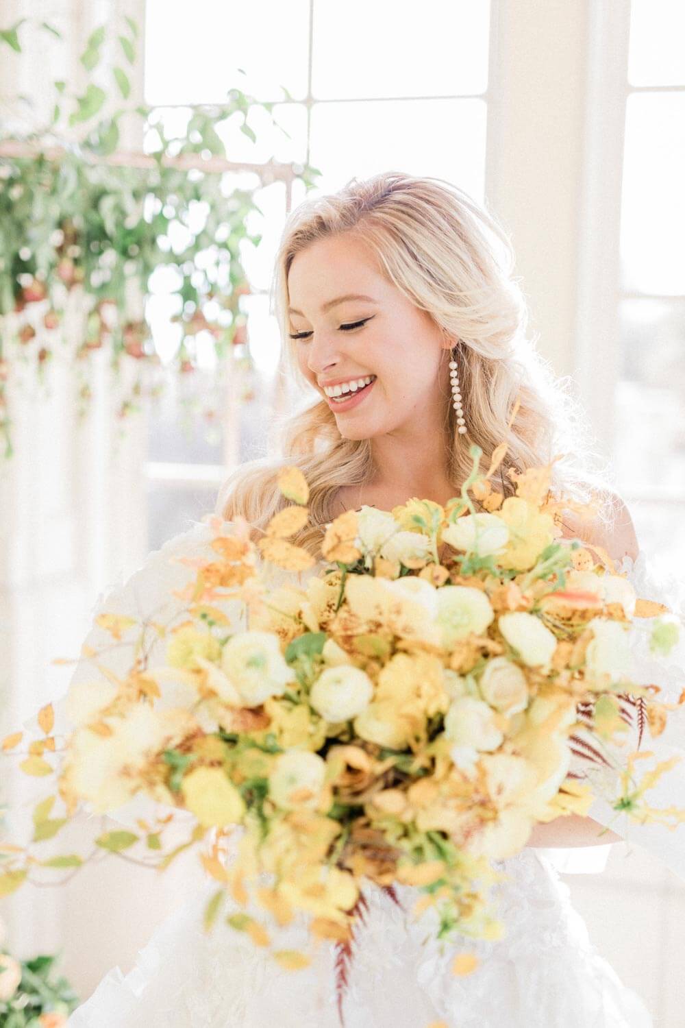 Bridal portrait with yellow roses